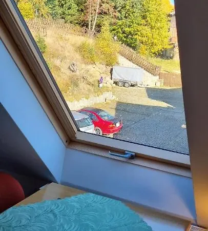 Goscinne Przy Kosciele Wang.