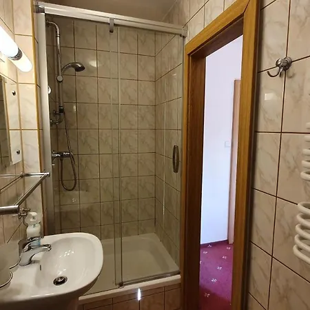 Goscinne Przy Kosciele Wang.