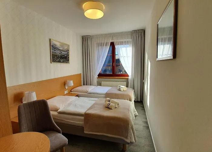 Goscinne Przy Kosciele Wang.